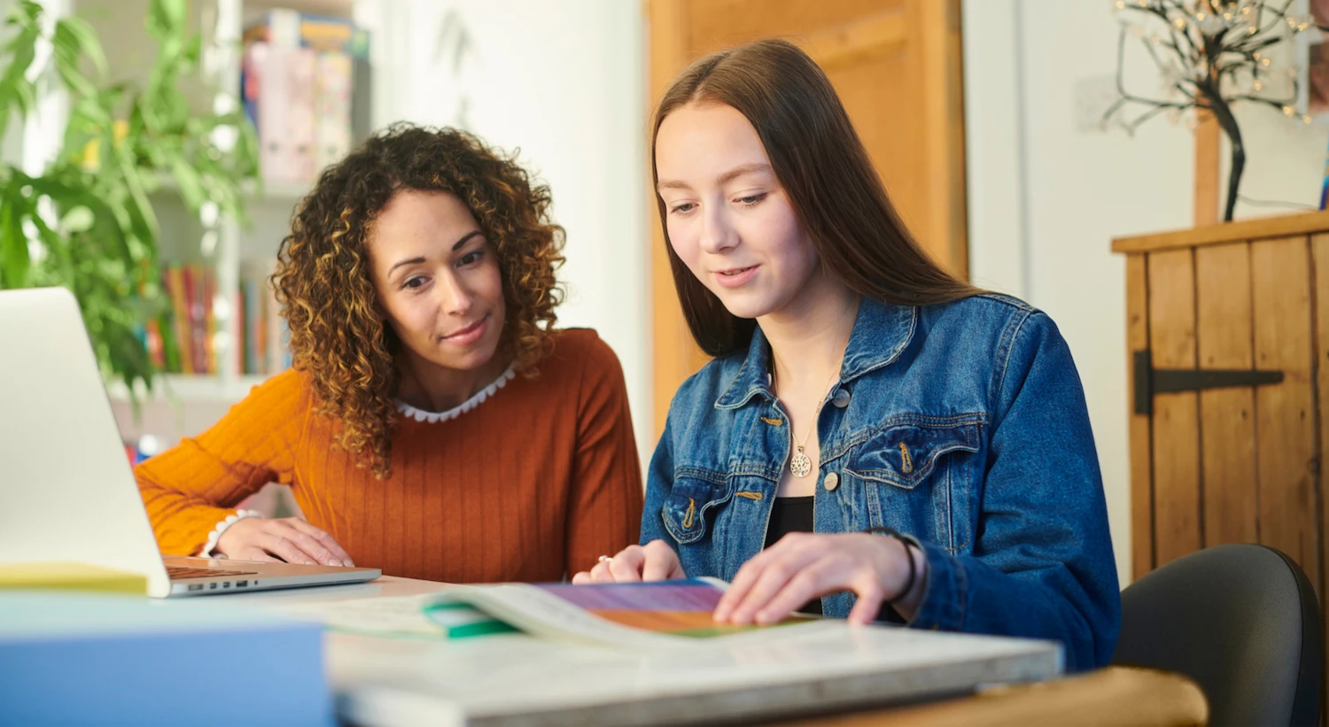 Private tutor working one-on-one with student
