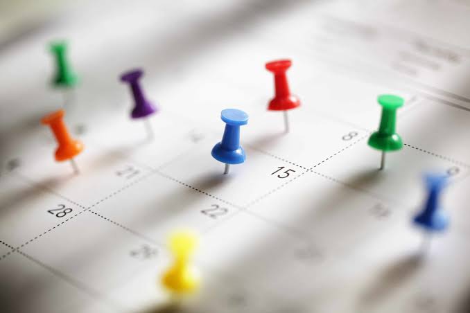 Calendar with thumb tacks